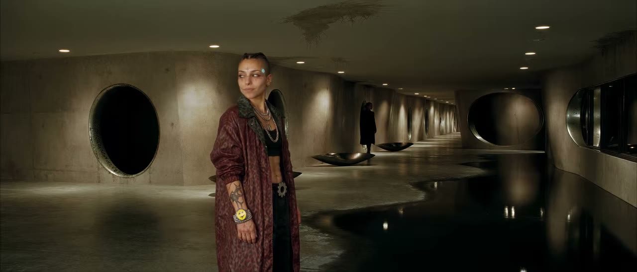 A concrete underground corridor in Veil of Maya