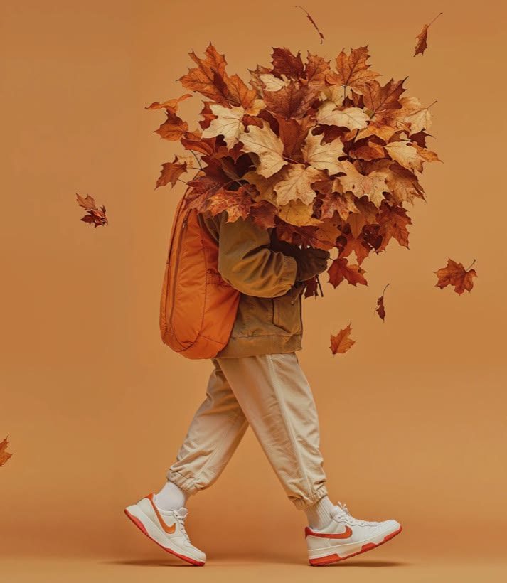A figure walking with an armful of autumn leaves for a head, the image his site pairs with the ambient TV art milestone