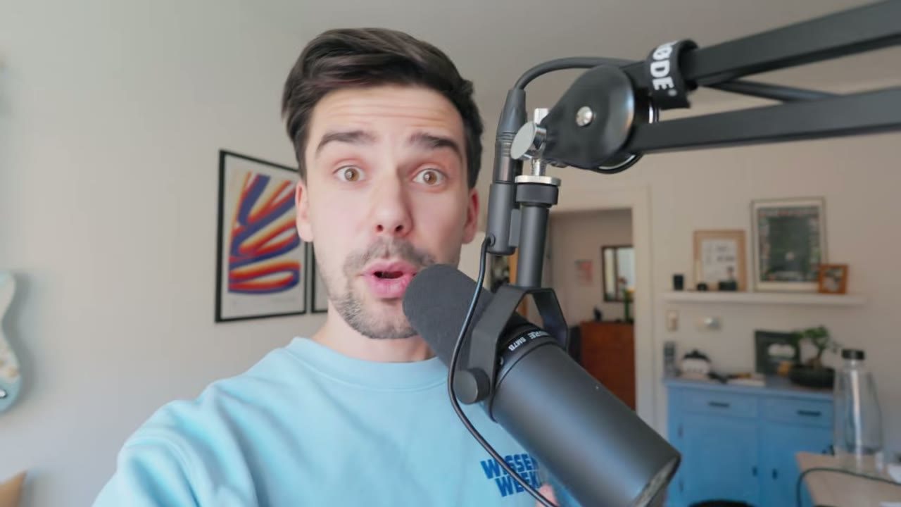 Robert Sladeczek speaking into a studio microphone