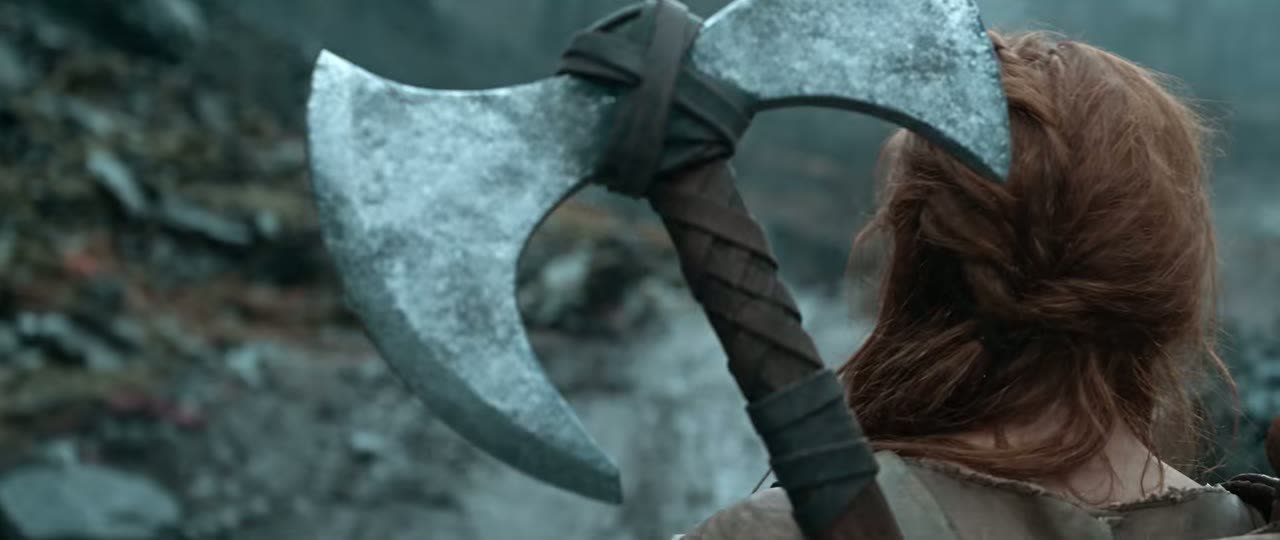 Over-the-shoulder shot of a warrior's axe, from The Bridge (2026)